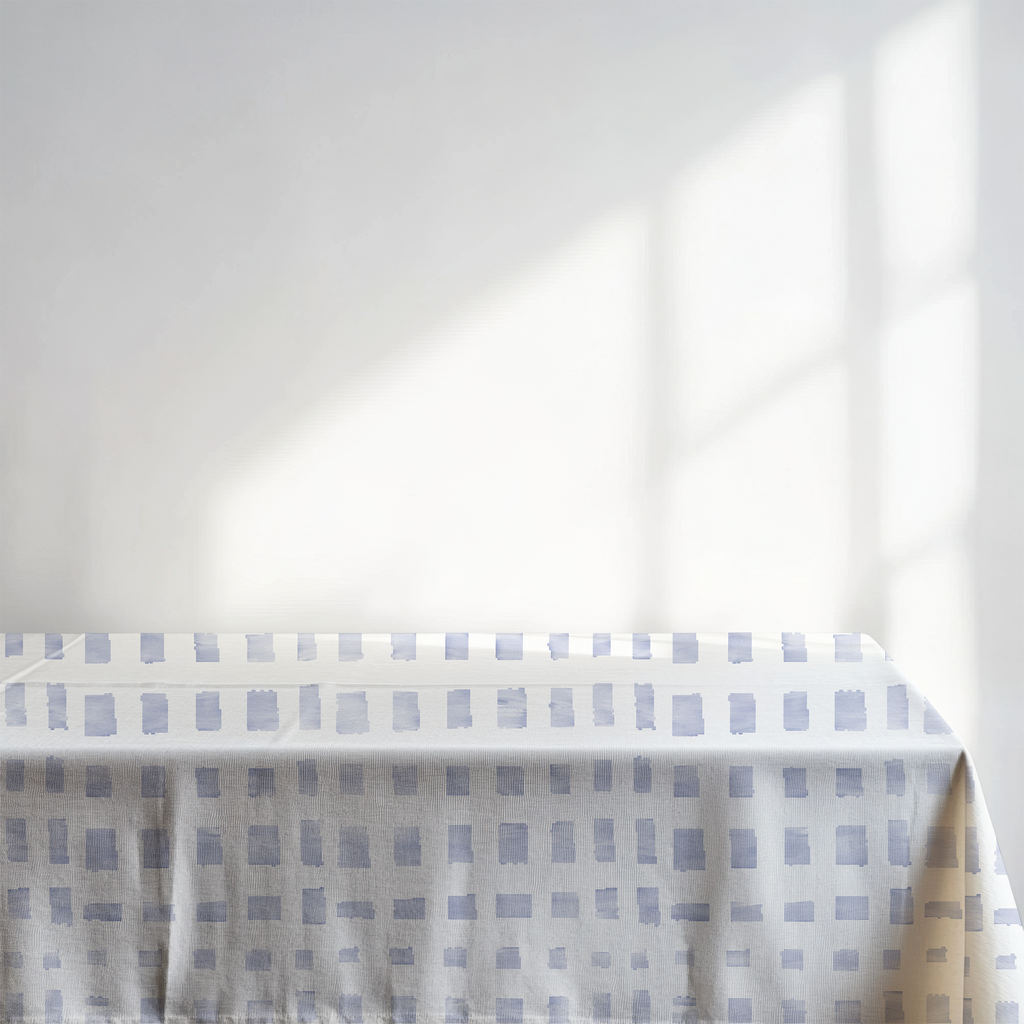Tablecloth with a blue checkered pattern on a white background