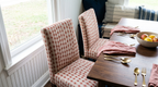 Ikat stripes in coral red, fabric